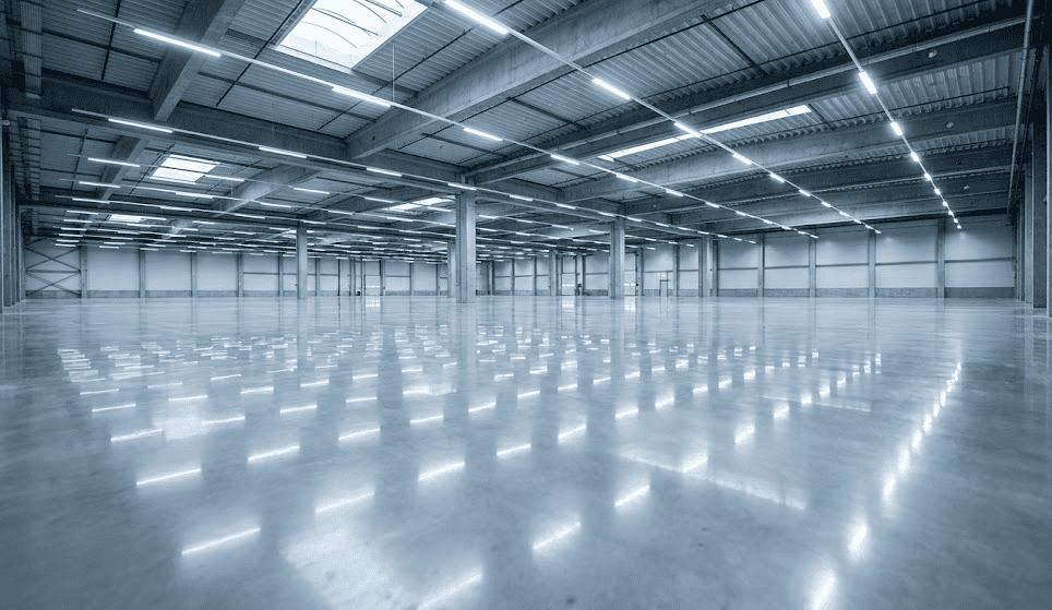 Polished concrete floor reflecting overhead light