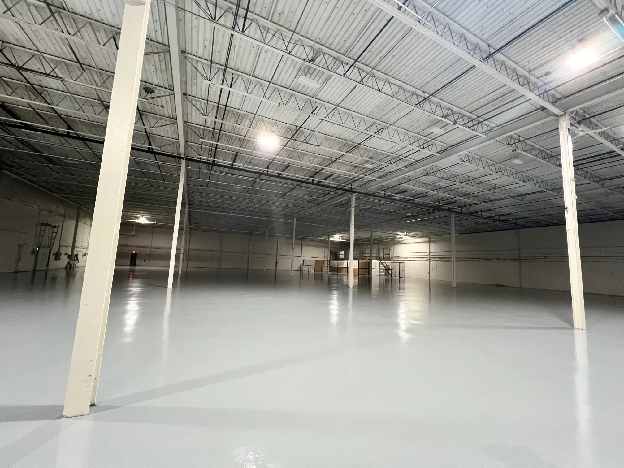 Repaired and coated floor at Pure Beverage